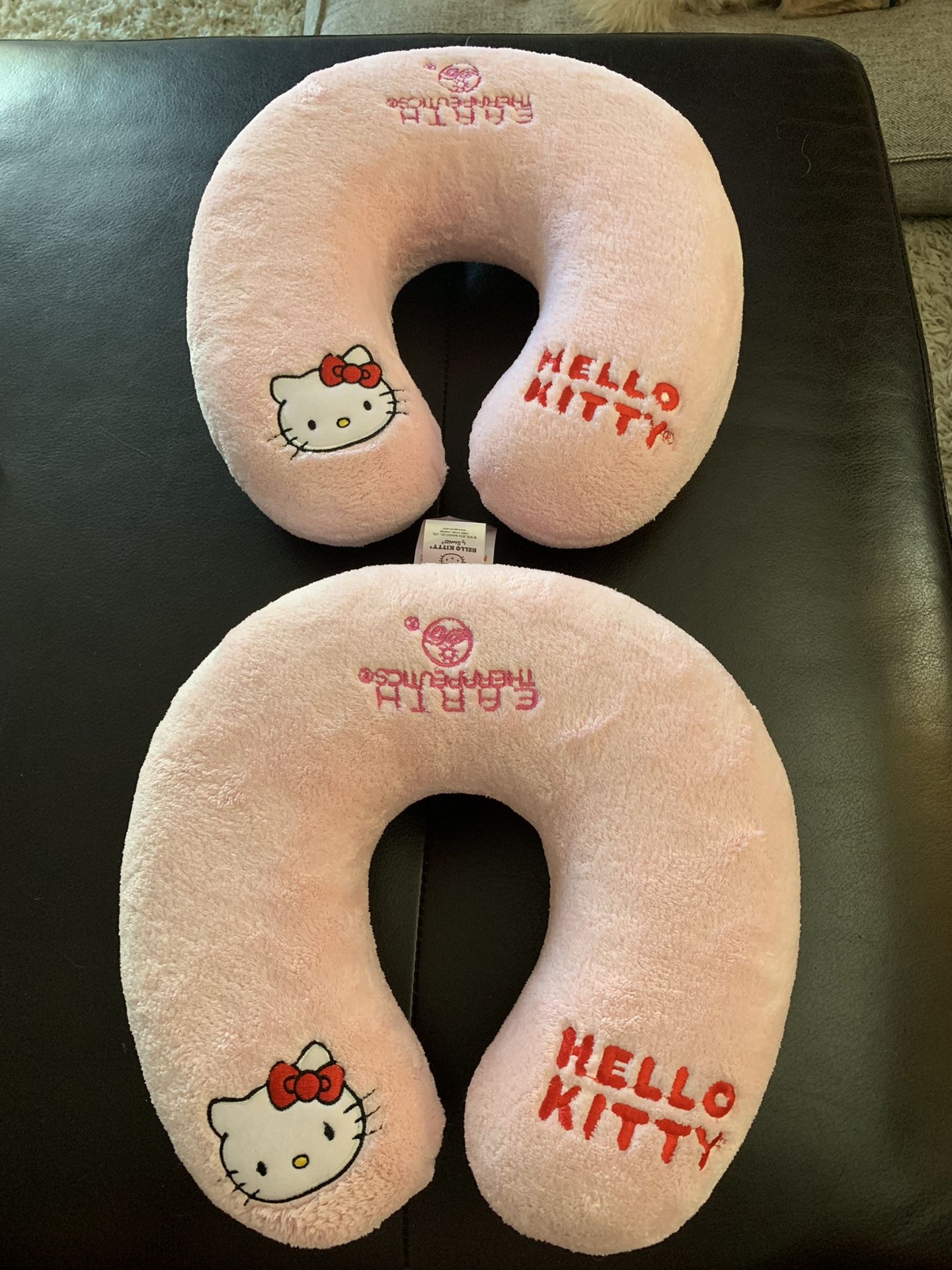 2 Hello Kitty pink neck pillows - excellent condition