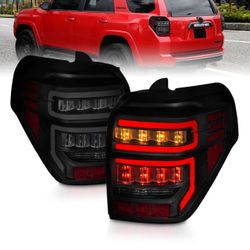 TOYOTA 4 RUNNER 4RUNNER  2014-2023 TAIL LIGHTS BLACK HOUSING SMOKE LENS RED LIGHT BAR