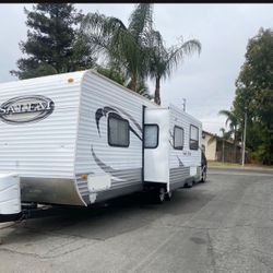 2010 Salem Forest River Trailer 26 ft with 12 feet slide out. 