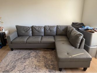 Grey faux leather sectional