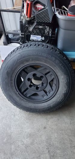 P225/75R15 barely used set of 4 Firestone Winter Force tires