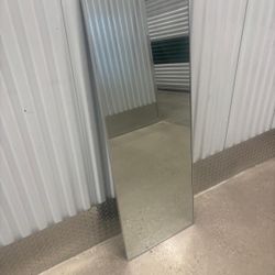 Silver chrome frame full dress back of the door mirror…. 20” x 55” . $50