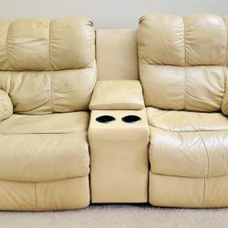 Tan leather recliner sofa set: one 3‑seater and one 2‑seater 
