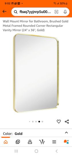 Minuover rounded corner rectangular mirror.