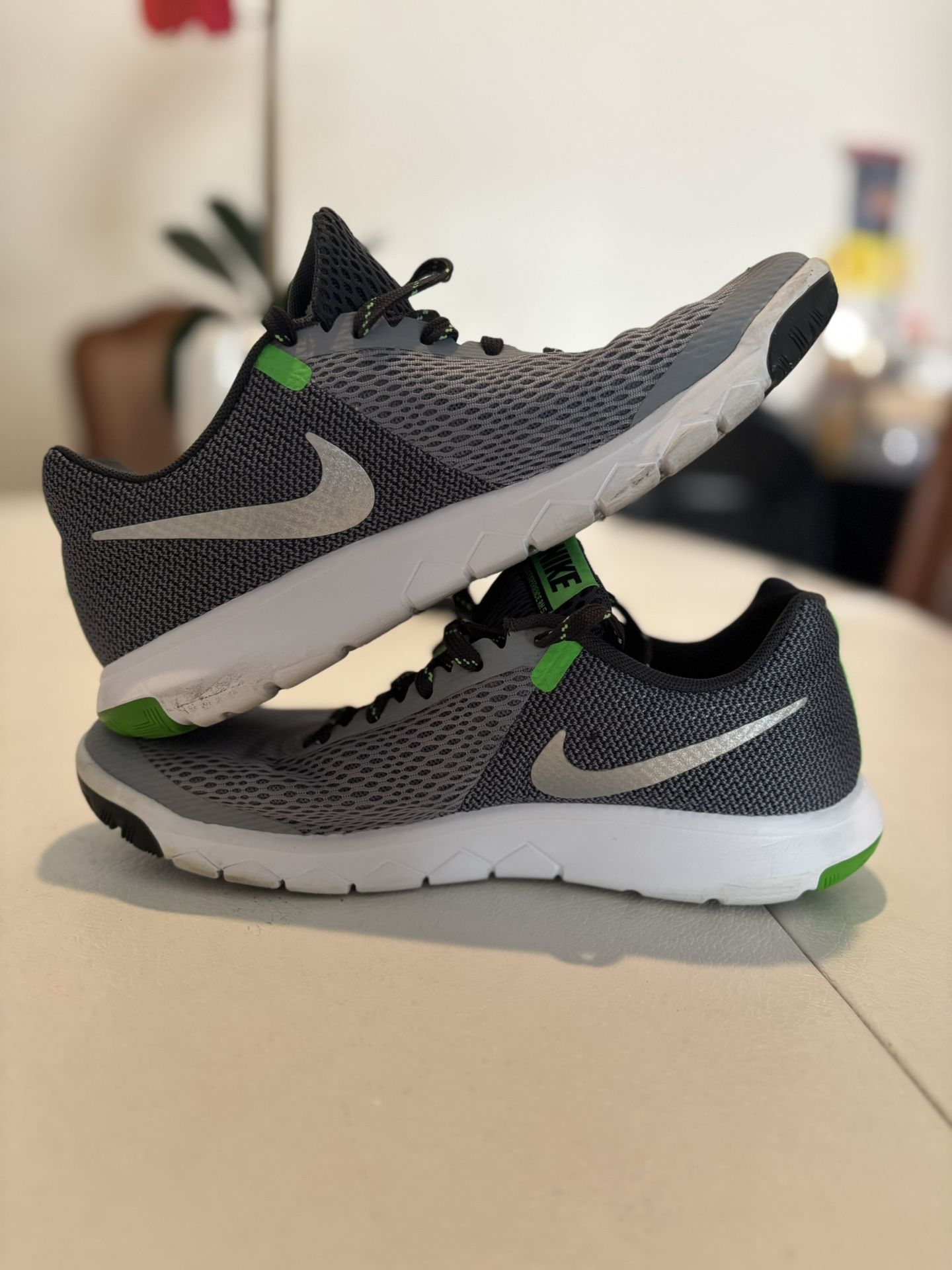 Gray and green Nike shoes Size 7 Us Men 