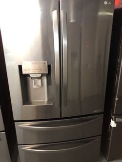New scratch and dent LG stainless steel French door fridge with bottom freezer. 1 year warranty