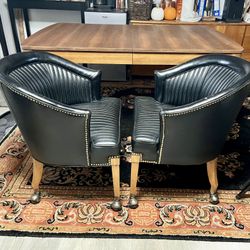 2 vintage rolling barrel club chairs