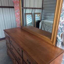 solid wood dresser with mirror, featuring a classic colonial style and brass hardware