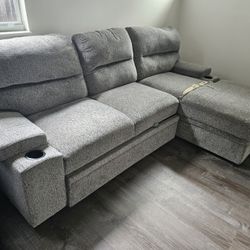 GREY COUCH/BED