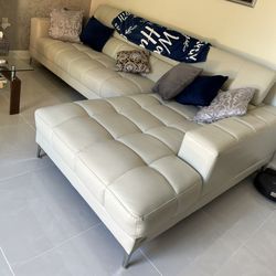 White Leather Modern Sectional. Rooms to go Sofia Vergara Collection. 