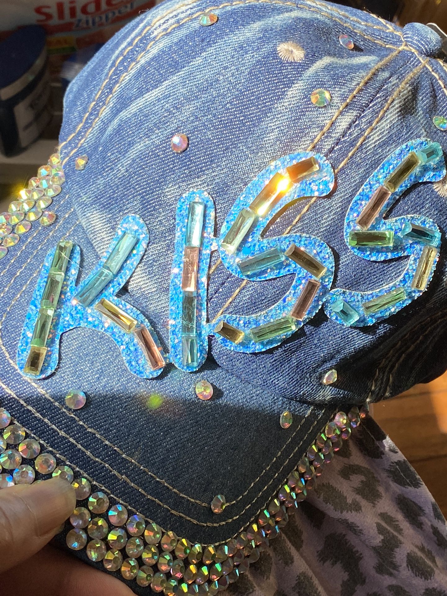 STYLE #12-KISS(DARK DENIM ). CUTE HAT W/BLING. SHINES & SHIMMERS IN THE LIGHT.