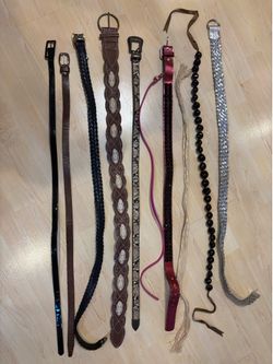 Women’s belts- Size Small/ Medium. 2 belts are Leather