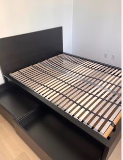 IKEA queen bed with storage and 2 side tables