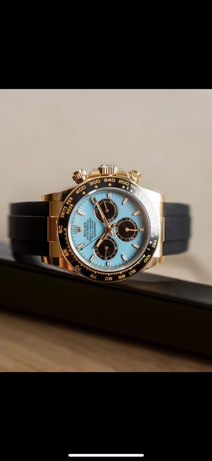 Rolex Cosmograph Daytona. This specific model features: • A yellow gold case • A striking “Tiffany blue”-like dial with