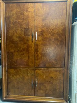 Thomasville media cabinet. Humphrey Bogart line