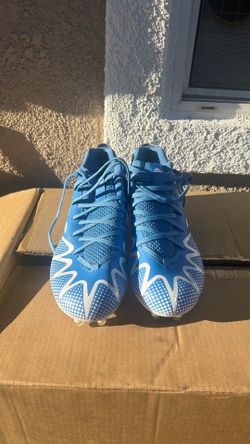Blue Adidas football cleats size 11
