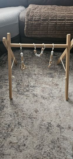 Wooden baby play gym