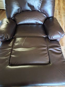 Brown faux leather recliner chair