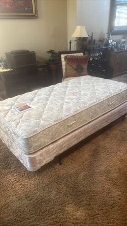 Twin Posturepedic Bed with metal frame