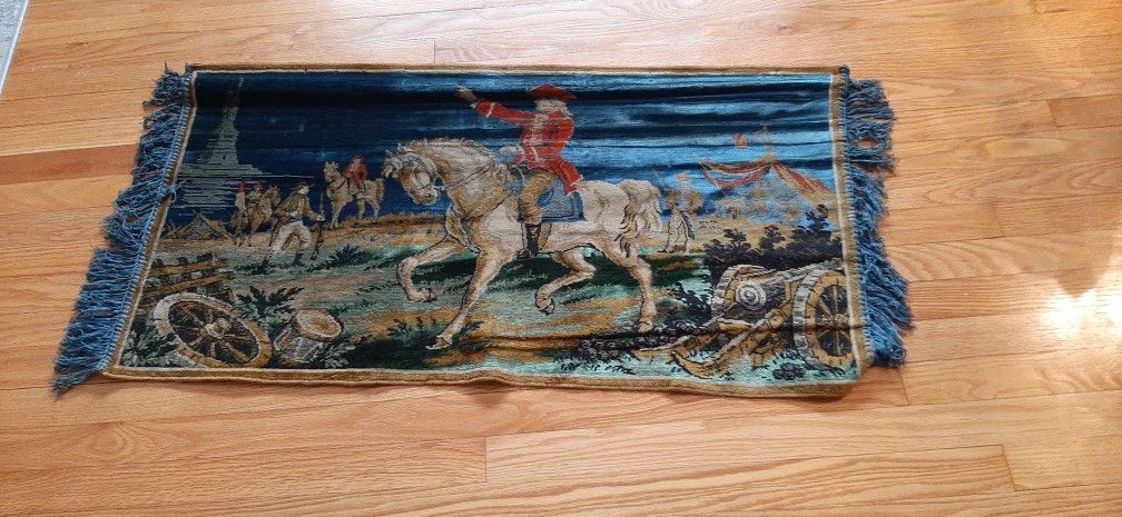 Vintage velvet wall tapestry with fringe. War scene