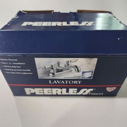 The Peerless P99673-L is a stylish and durable two-handle Low Arc Counterset Lavatory Faucet designed for any use. With its classic design and reliabl