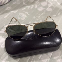 Raybans gold trim