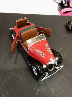 Vintage coca cola 1936 die cast model automobile Ford roadster with stand located in palm springs ca excellent