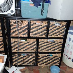 Wood storage cabinet with storage bins
