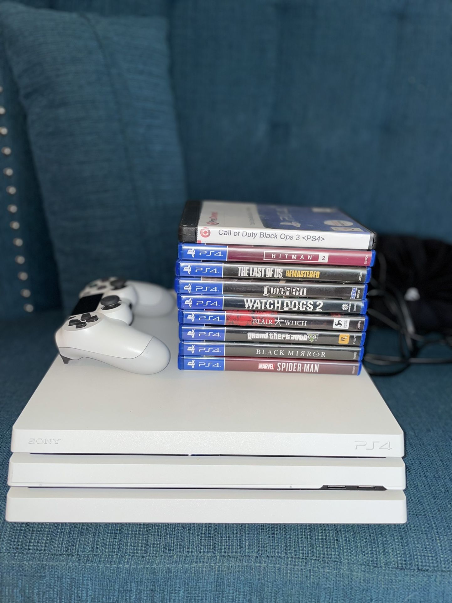 Playstation 4 Pro (Glacier White) with 9 games
