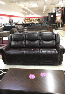Reclining leather sofa