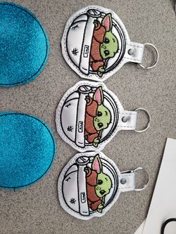 Baby Yoda key chain holders and car coasters