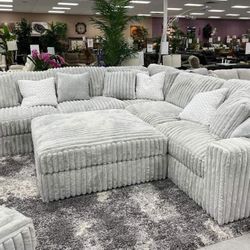 Stupendous 3-Piece Sectional with Ottoman in Alloy
