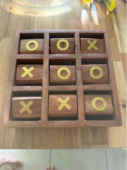 Revolving wood tic-tac-toe game