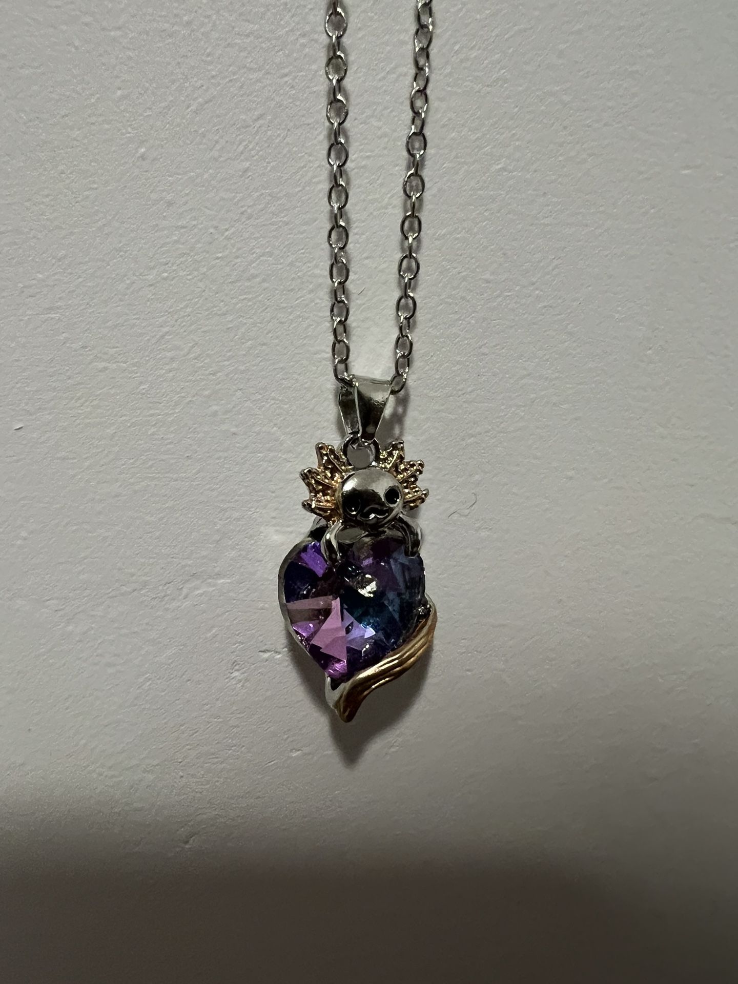 Cute Necklace With Sun Emoji On it.