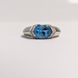 Blue Topaz And Diamond Ring 