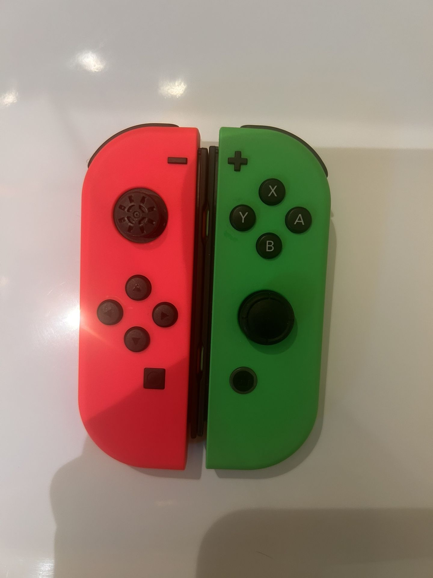 Green And Pink Nintendo Switch Joycons