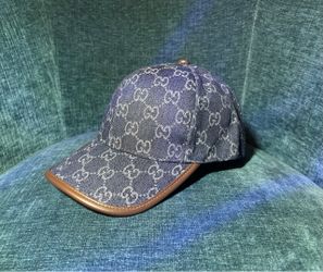 Blue hat with brown rim