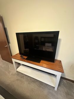 Entertainment Center Table and Sony Flat Screen TV with Remote