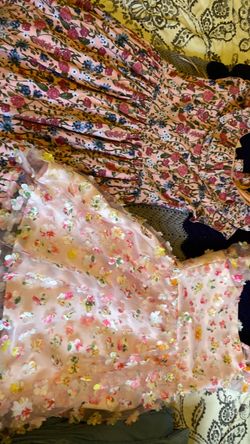 One size 10/12 dress one size 14