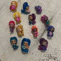 13 Tinie Genies Figurines. 