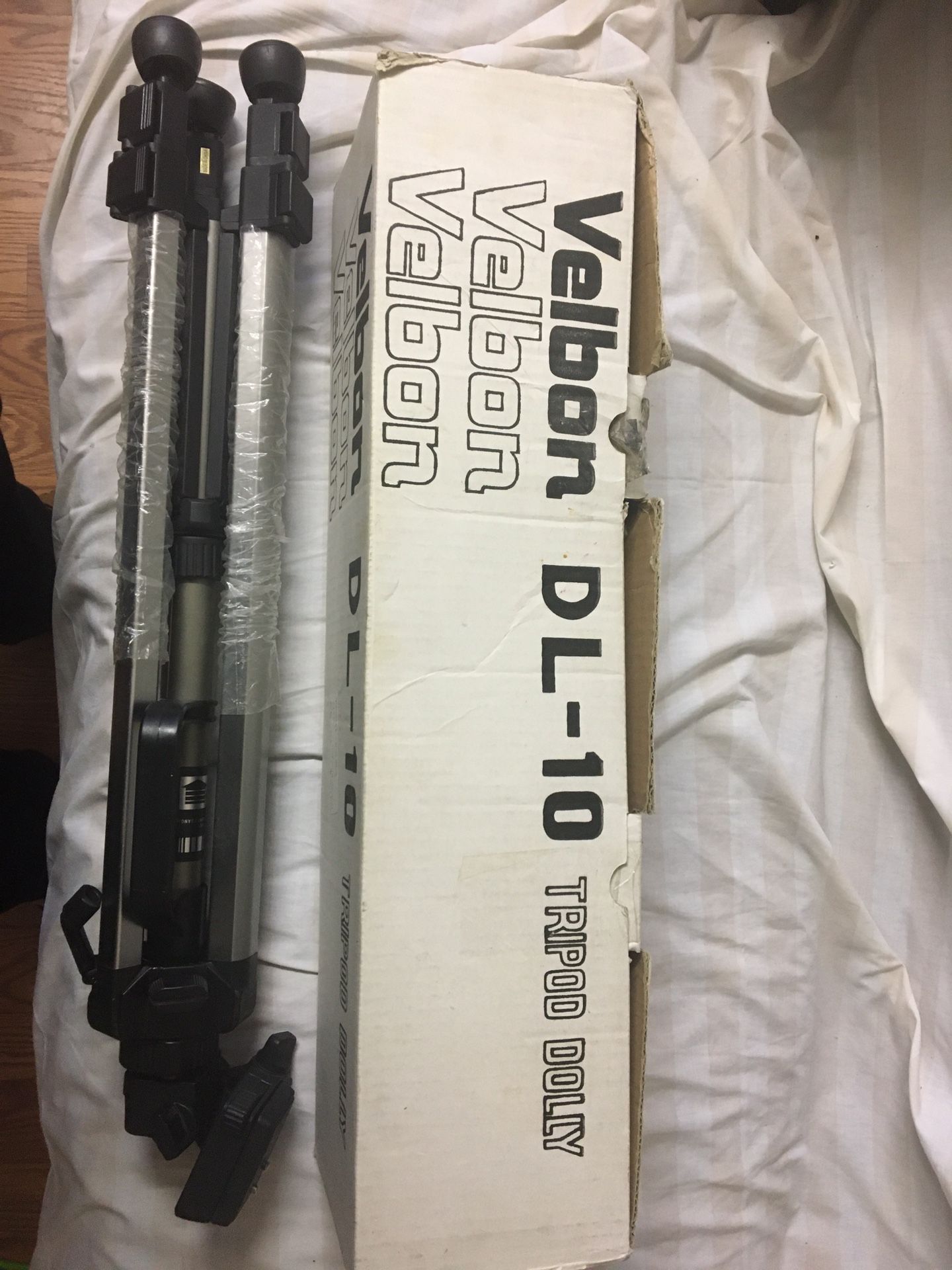 Tripods and tripod dolly for cameras