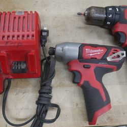 Milwaukee 12V 3/8 Hammer Drill/Driver 2408-20 2462-20 12v impact driver 1.5 AH BATTERY , 48-59-1812 CHARGER ,KIT USED. TESTED. IN A GOOD WORKING ORDER