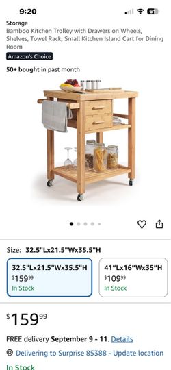 Wooden kitchen island cart with storage and butcher block