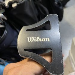 Wilson Harmonized golf putter in right hand  35 shaft 