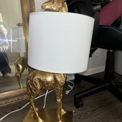 Gold Giraffe Lamp with Linen Shade $35