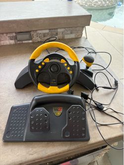 Mad Catz 2 steering wheel and pedal set