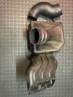 Stage one supercharger coody air factory intake.