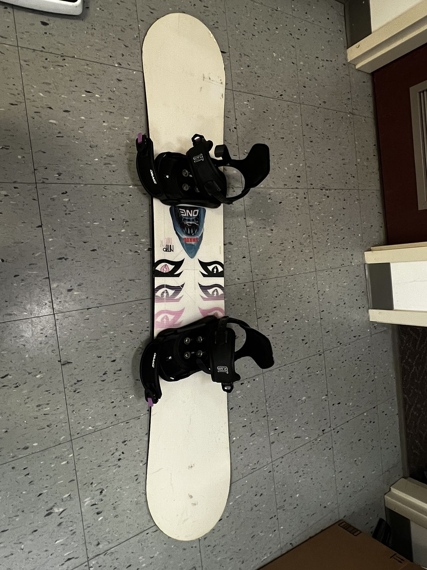 Snowboard With Bindings And Helmet