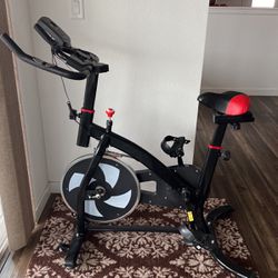 Exercise bike With adjustable seat and handlebar