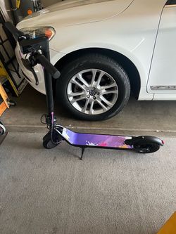 New Electric Scooter with Purple Graphic Deck